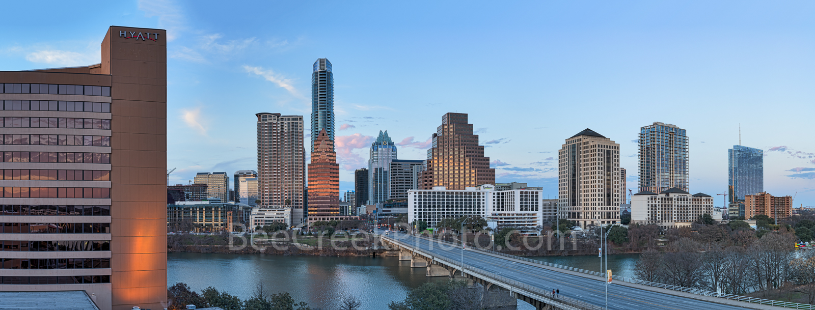 Austin Sunset Skyline Pano - An Austin Sunset Skyline panorama that looks up Congress bridge as it crosses Lady Bird Lake into...