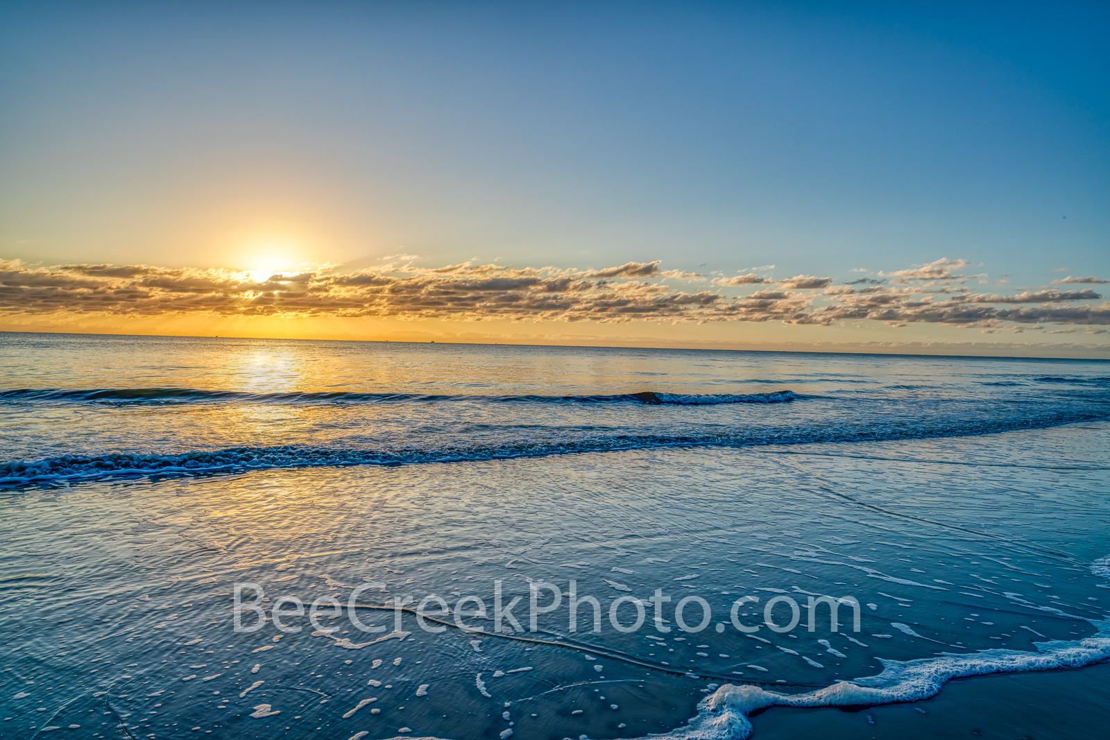 Ocean Serenity - This wonderful seascape taken in early morning right after sunrise presented a nice golden glow over the blue...