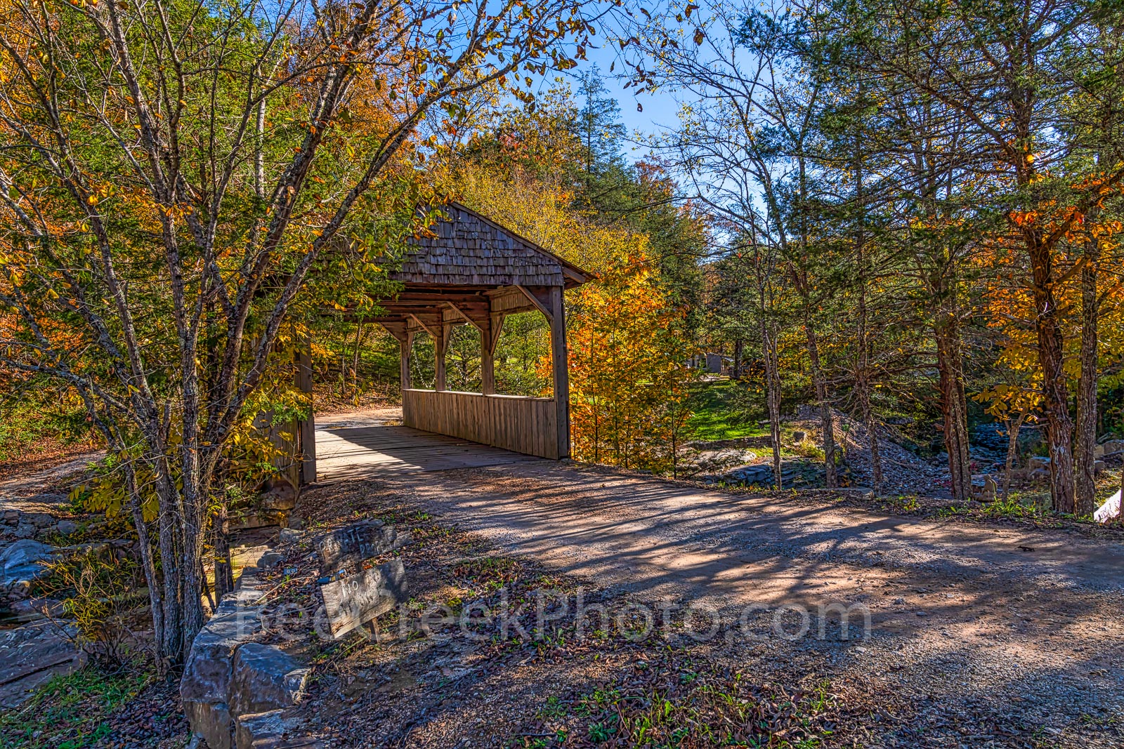 Rural Covered Bridge Fall - On the back roads of the Ozark we found this covered Bridge with all the autumn colors around it...