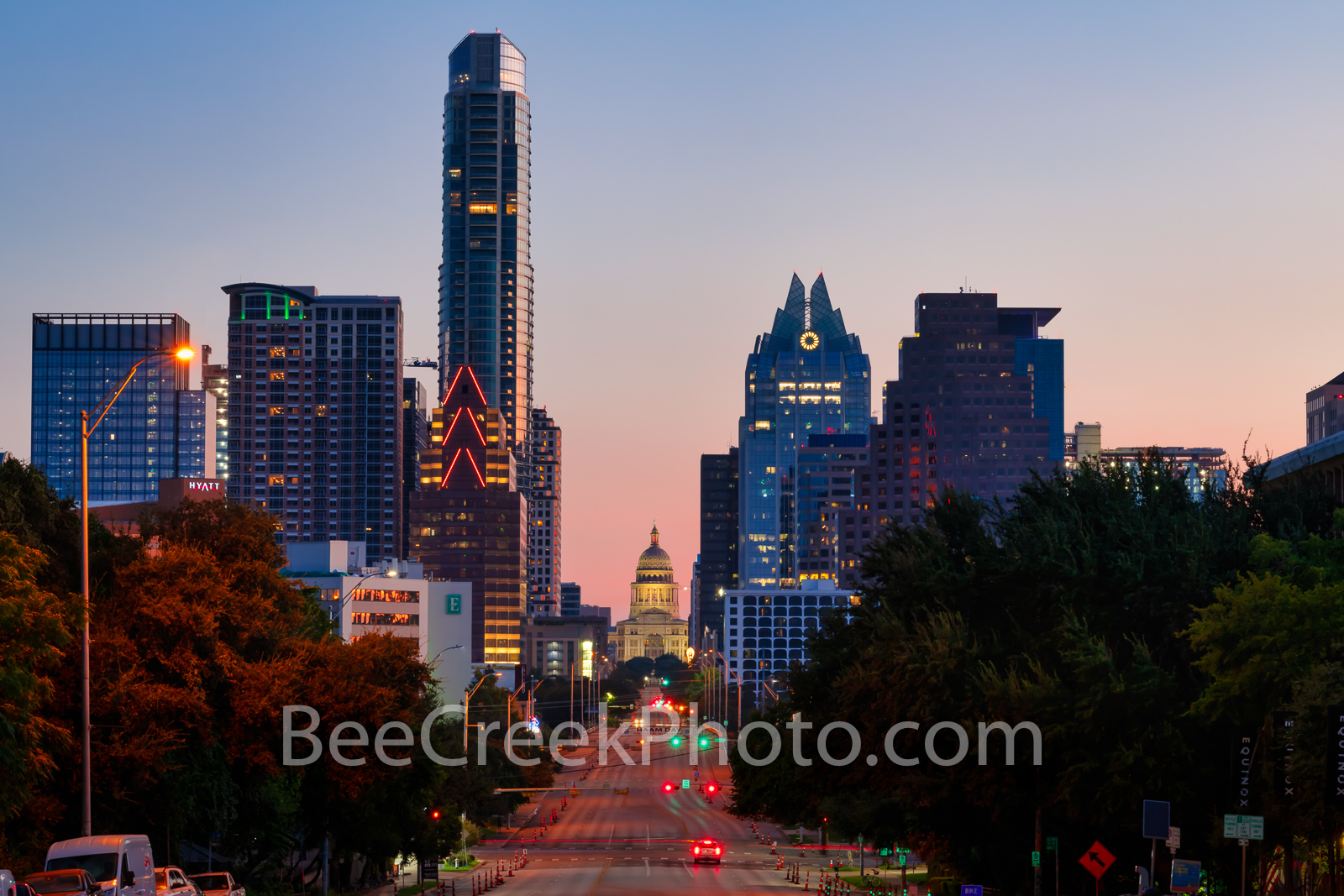 Texas Capitol from Austin SOCO Sunrise  - A view looking up Congress toward the Texas Capitol in downtown with the Austin skyline...